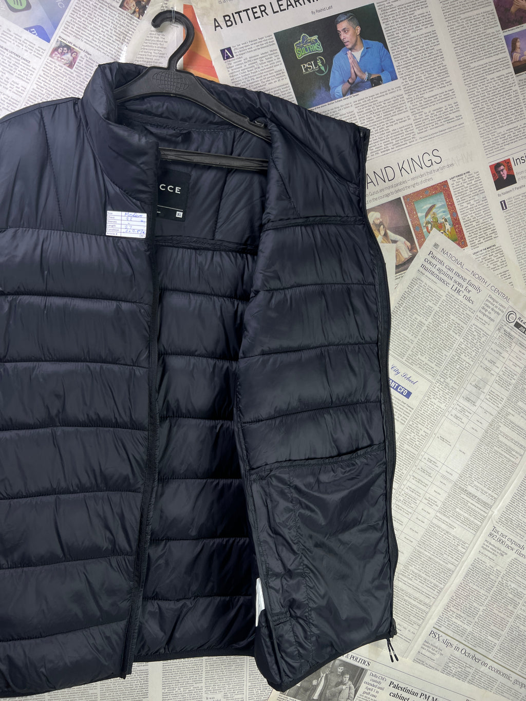 Nicce® Medium | Chest: 22" | Black | Sleeveless Puffer Jacket | 1986 - Genuine Maal